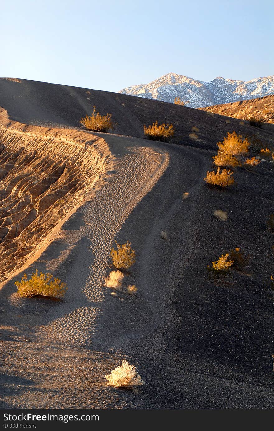 The pathway leading to the rim of a volcano crater in Death Valley California. The pathway leading to the rim of a volcano crater in Death Valley California