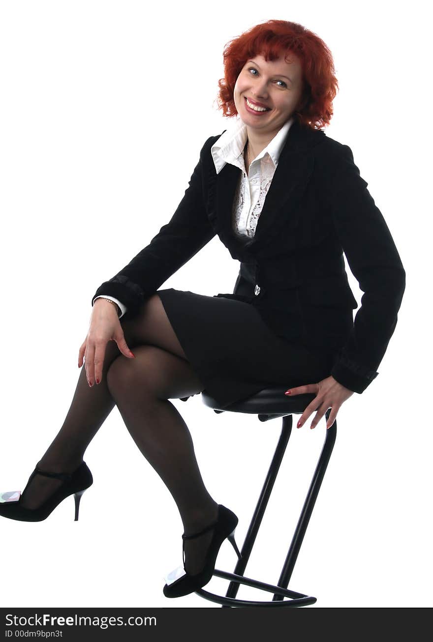 Businesswoman sits on a chair on a white background