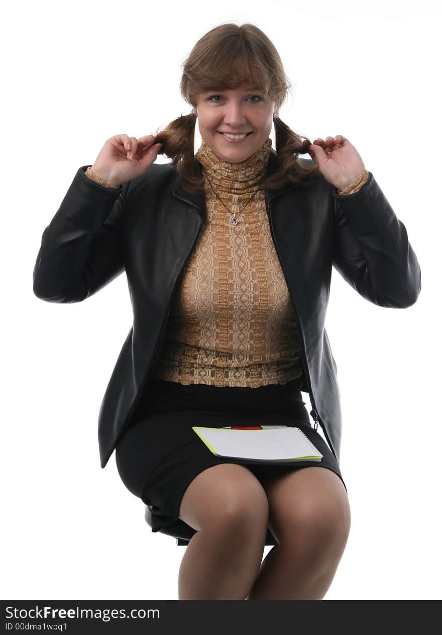 The girl sits on a chair and keeps for hair. The girl sits on a chair and keeps for hair