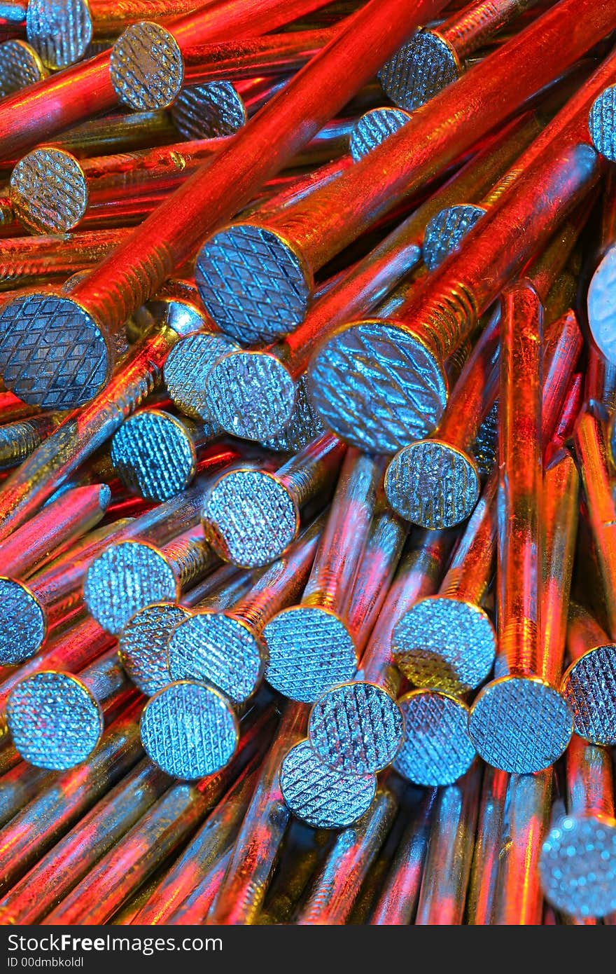 Nails from very close, lit by three flash-units witzh filters of different colour. Nails from very close, lit by three flash-units witzh filters of different colour