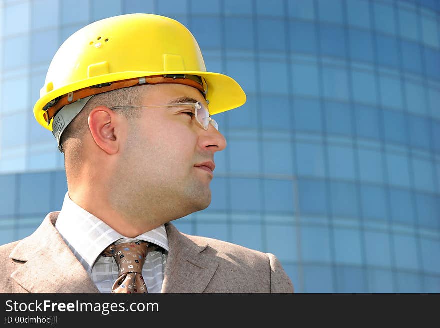 Portrait of an businessman with helmet. Portrait of an businessman with helmet