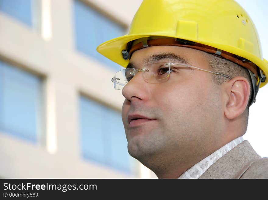 Portrait of an businessman with helmet. Portrait of an businessman with helmet