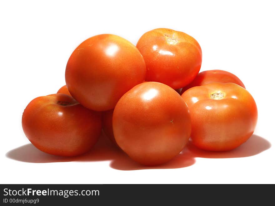 Red fresh tasty tomatoes isolated on white background