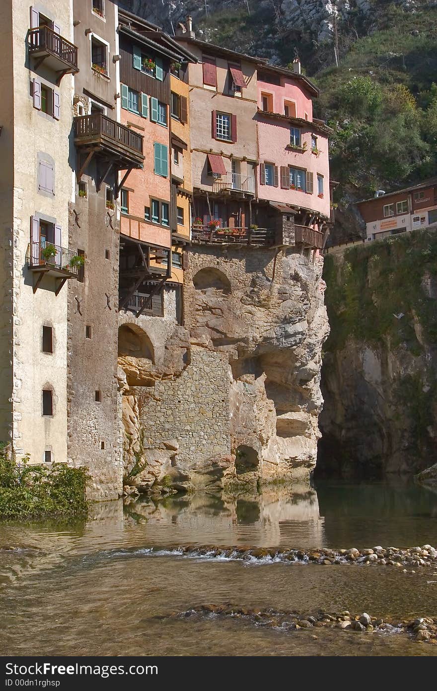 The medieval city constructed on rocks about the mountain river. The medieval city constructed on rocks about the mountain river