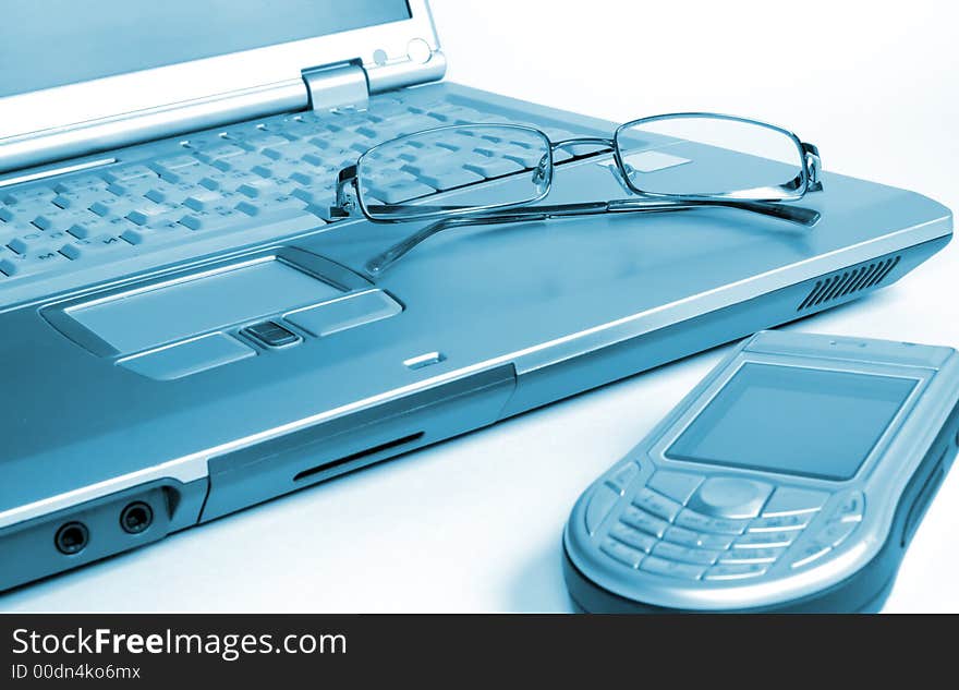 Business tools and eyeglasses over white. Business tools and eyeglasses over white