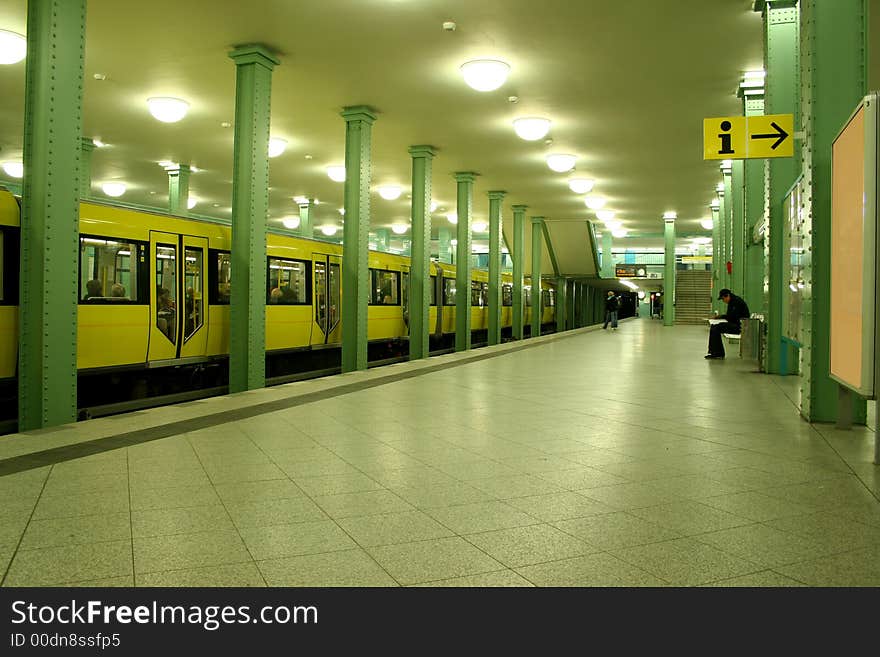 Man sitting at lonely underground station. Man sitting at lonely underground station