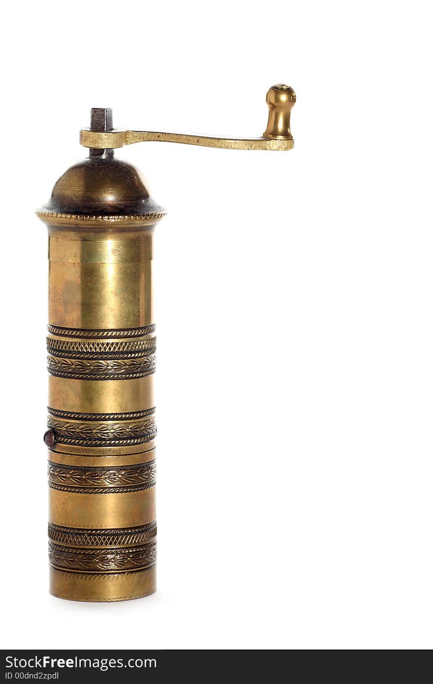 Old brass pepper pot