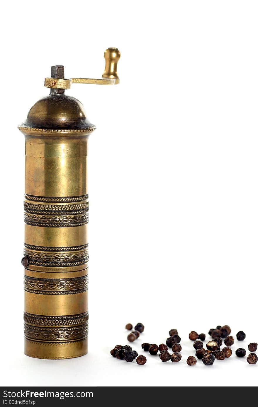 Old brass pepper pot