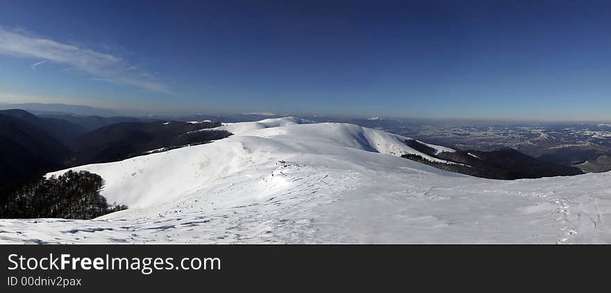 Panoramic picture of Carpathian mountain range in winter time. Panoramic picture of Carpathian mountain range in winter time