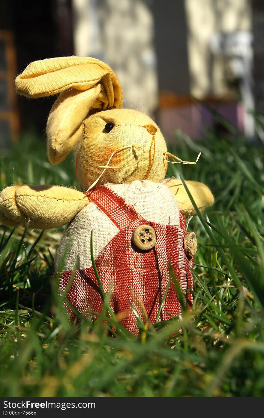 Beautiful textile easter rabbit with green background