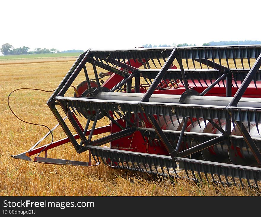 Modern harvester wheat blade detail. Modern harvester wheat blade detail