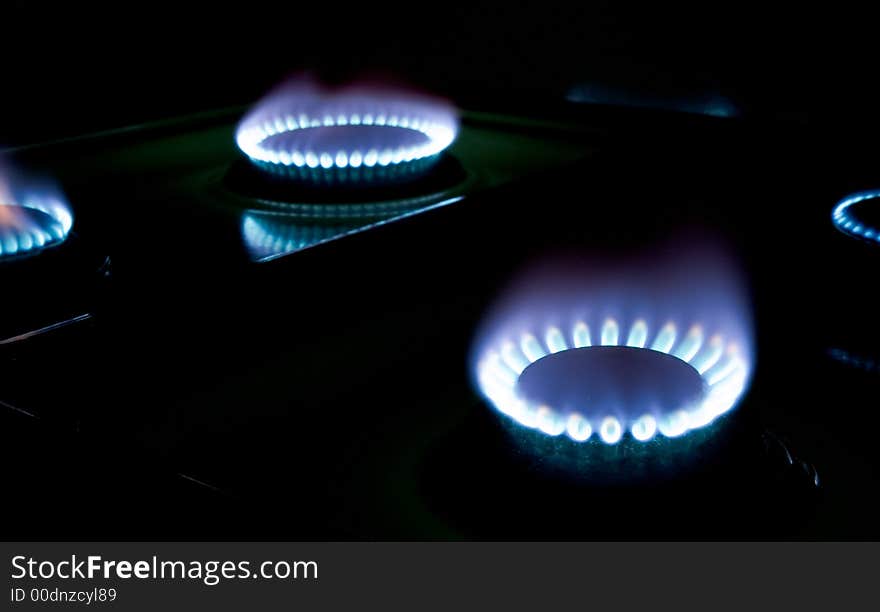 Macro shots of some stove burners in the dark. Macro shots of some stove burners in the dark