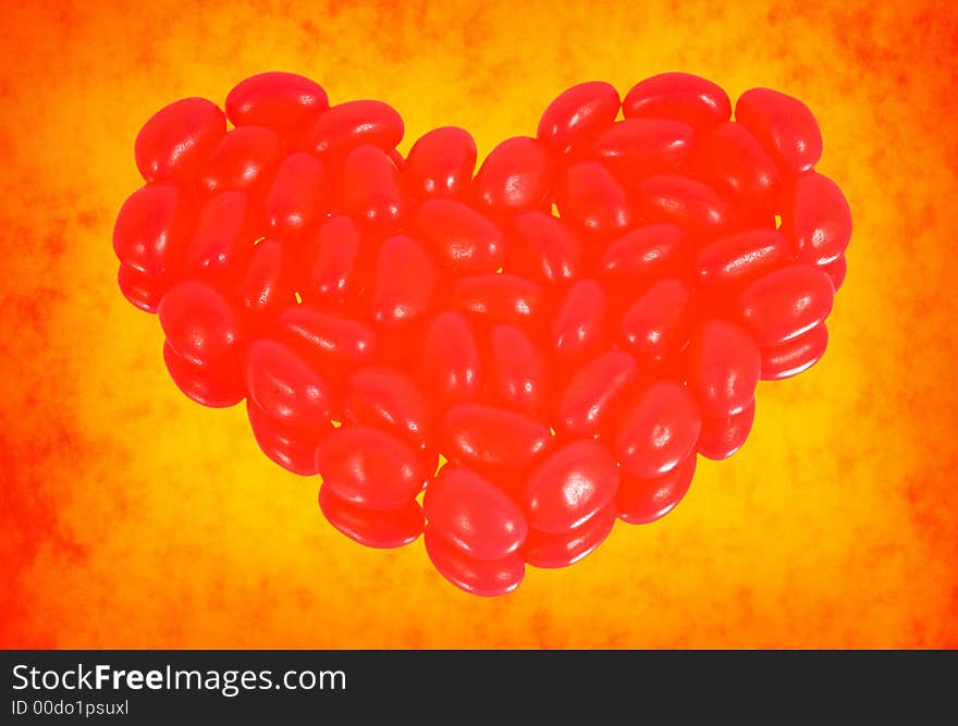 Jellybean heart on a vibrant orange lightly textured background