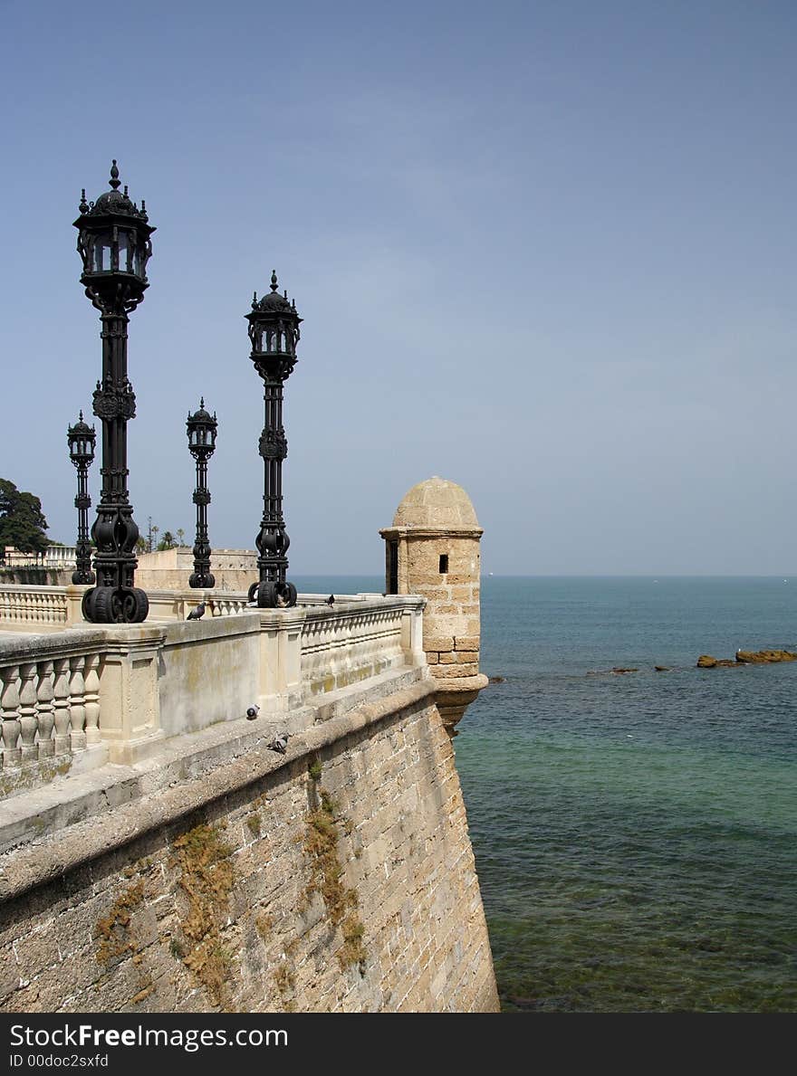 Historical wall with black lanterns