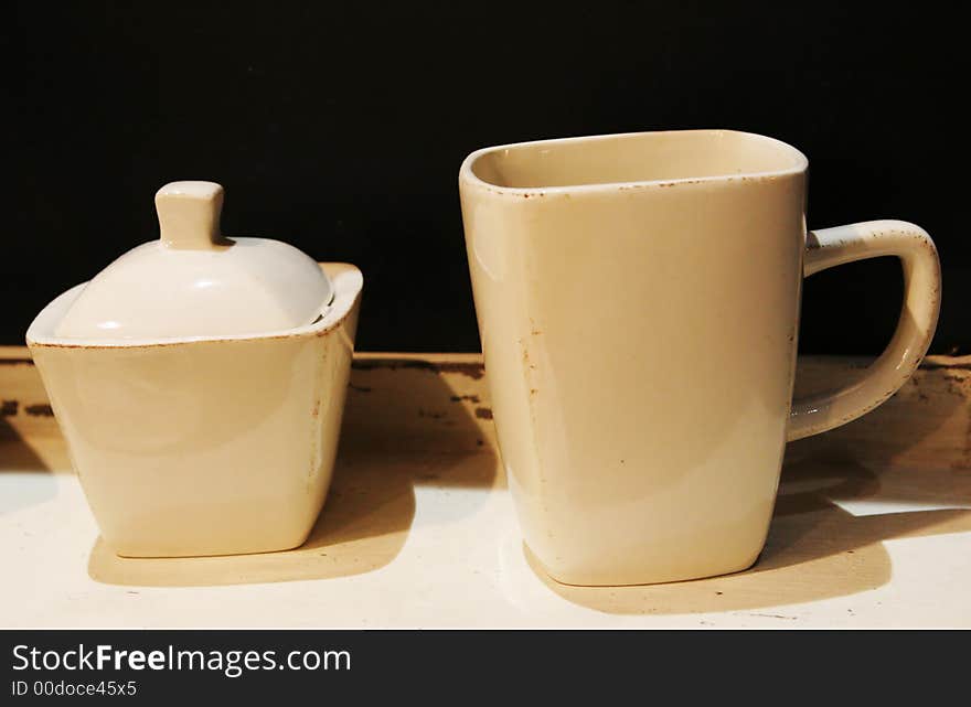 Cup and sugar bowl