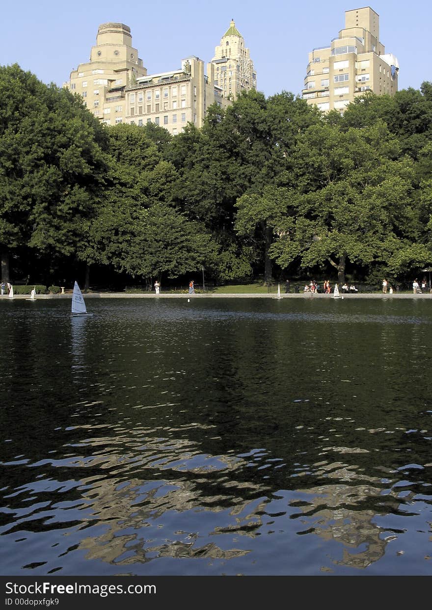 Mini sailing boats in the artificial lake of central parc in the city of New York, United States of America. Mini sailing boats in the artificial lake of central parc in the city of New York, United States of America