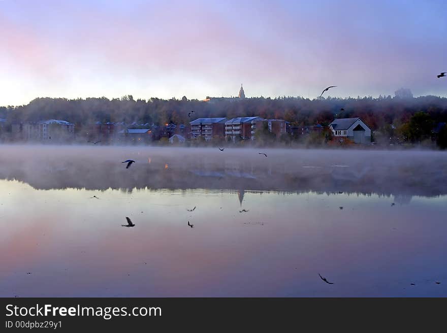 Sunrise in Quebec thawing the fall thin ice. Sunrise in Quebec thawing the fall thin ice