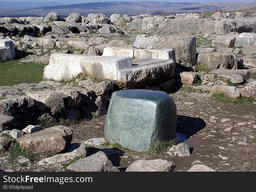 Green stone and ruins