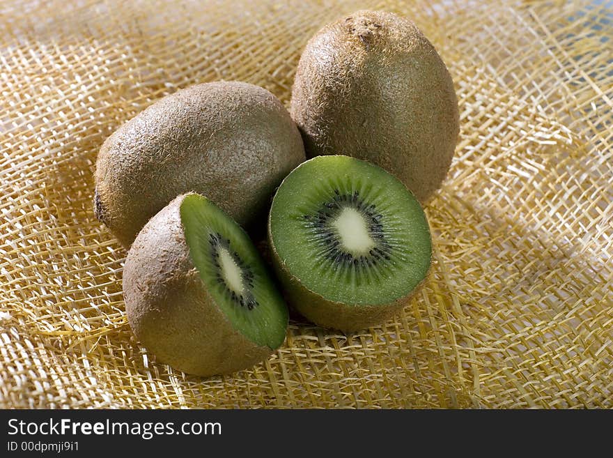 A photo of three kiwi