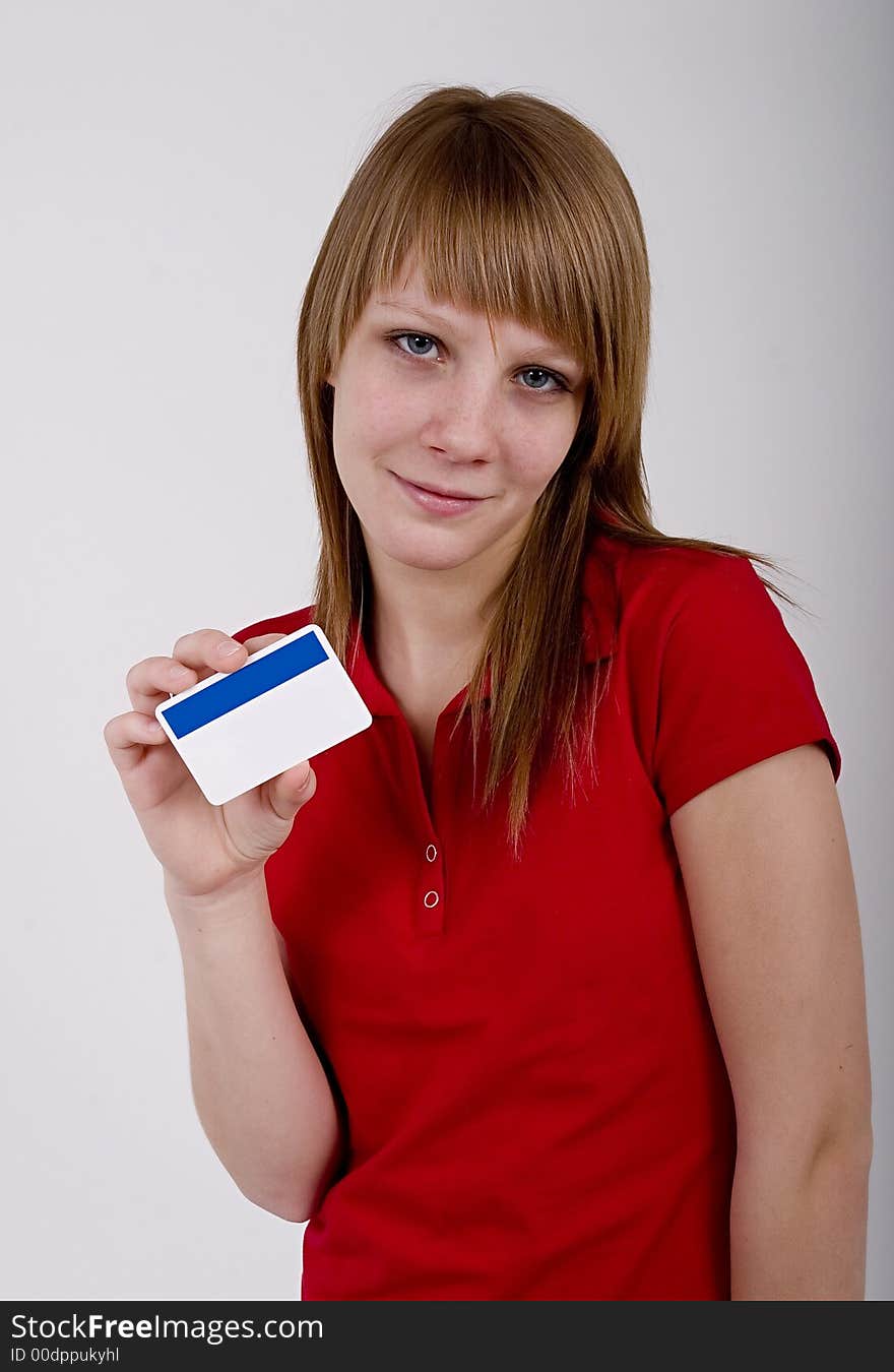 Teen girl with an empty card in hand. Teen girl with an empty card in hand