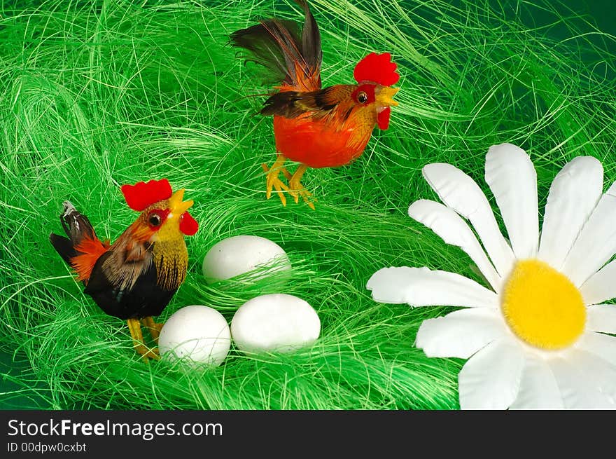 Easter chicken decorated on green grass. Easter chicken decorated on green grass