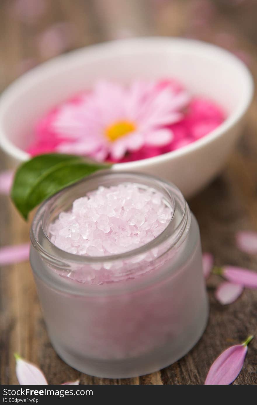 Aromatherapy salts & flowers - shallow depth of field. Aromatherapy salts & flowers - shallow depth of field