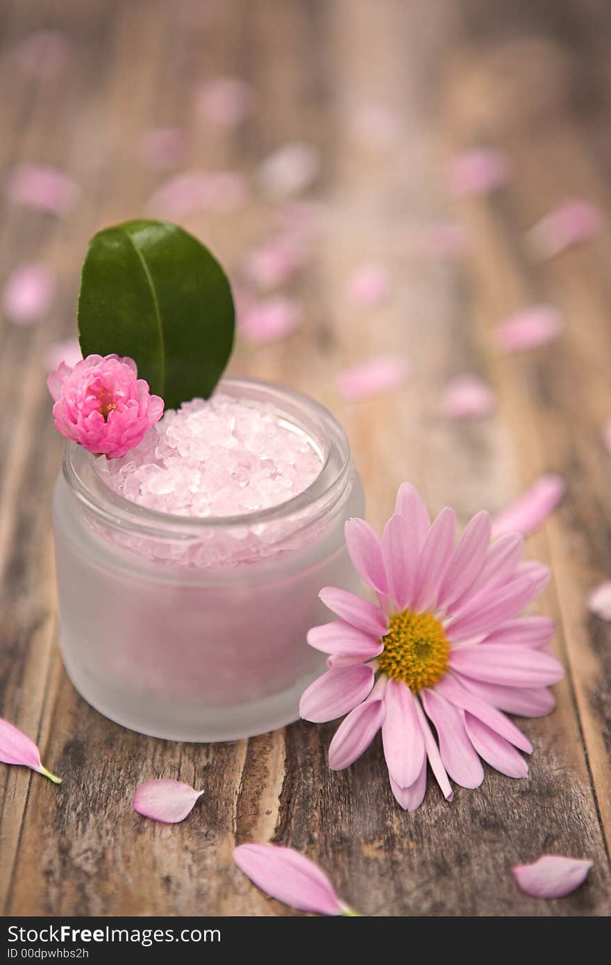 Aromatherapy salts & flowers - shallow depth of field. Aromatherapy salts & flowers - shallow depth of field