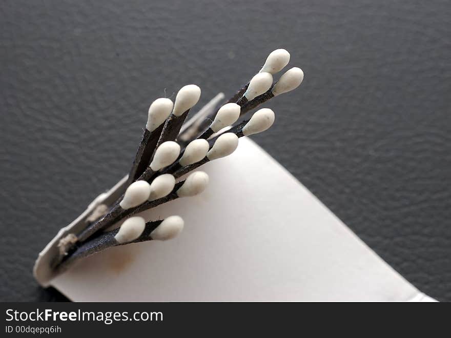 Macro of a pack of white tipped matches. Macro of a pack of white tipped matches