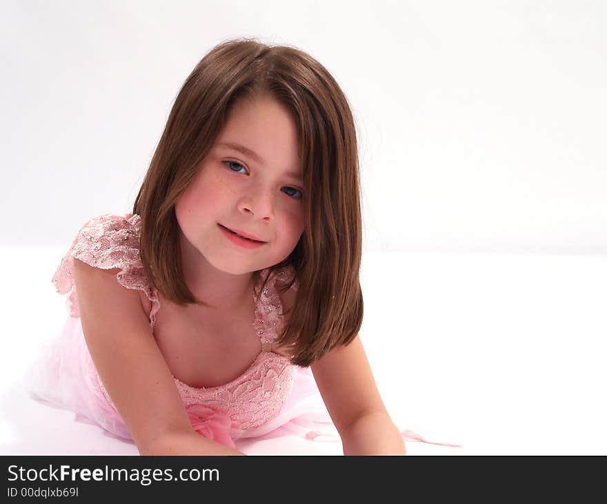 Brunette little girl on white. Brunette little girl on white