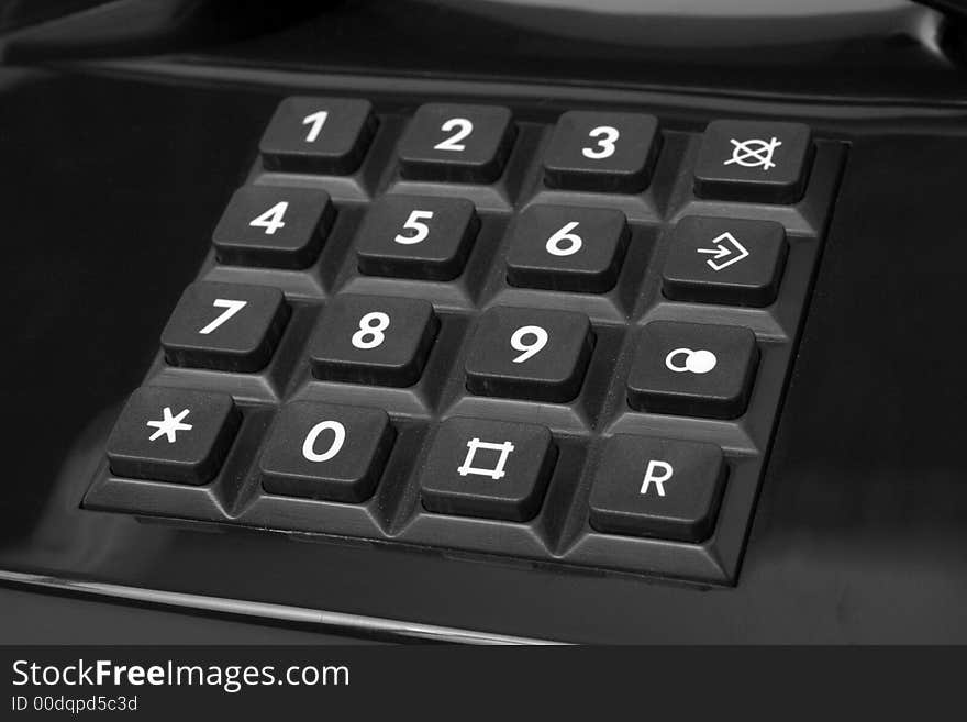 Push-button dial of phone of black color, isolated