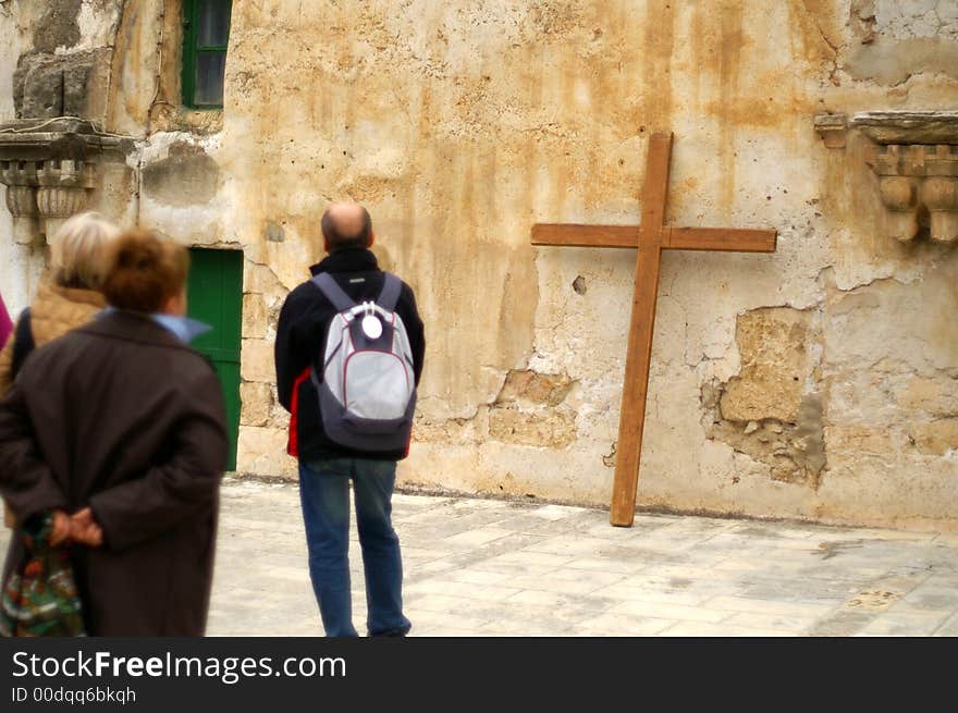 Pilgrim with a cross in  jerusalem on the last christ road