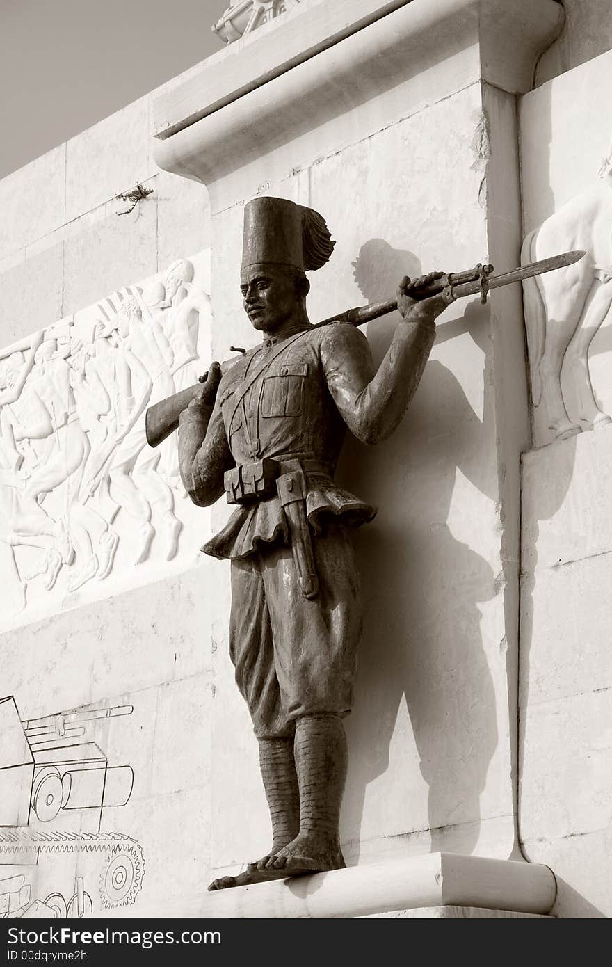 World war monument soldier is a photo of a monument dedicate to fallen in Africa war. It is a Sicilian monument in Siracuse city.