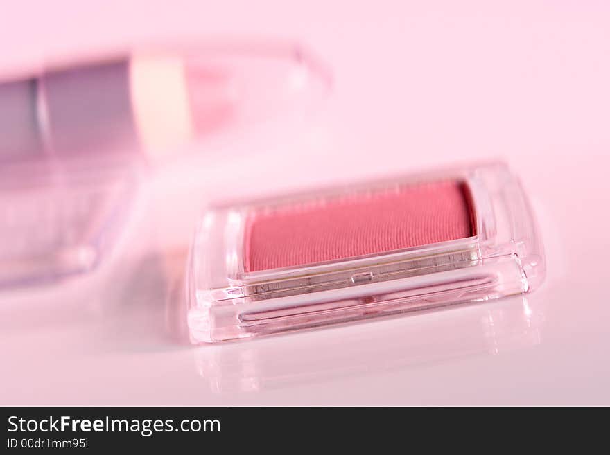 Cosmetic product close-up with pink cast. Cosmetic product close-up with pink cast