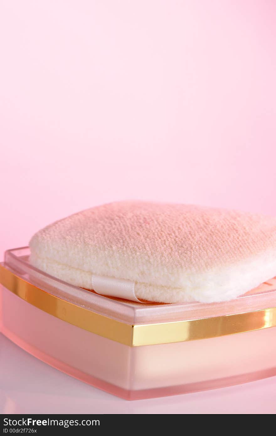 Cosmetic powder with pink cast