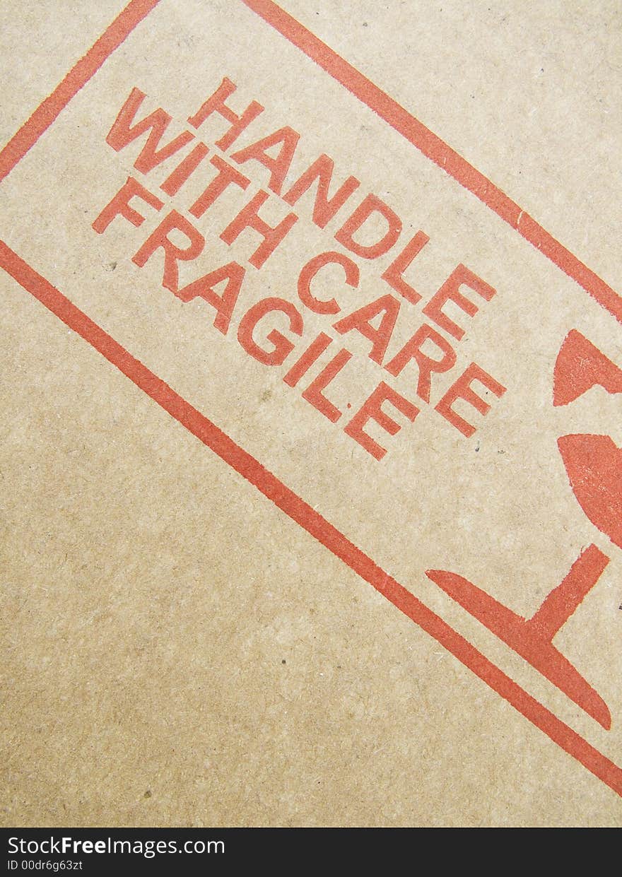 Image of caution print on the side of cardboard. Image of caution print on the side of cardboard