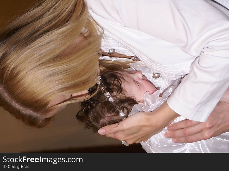 Young lady hilding a few month old baby. Young lady hilding a few month old baby