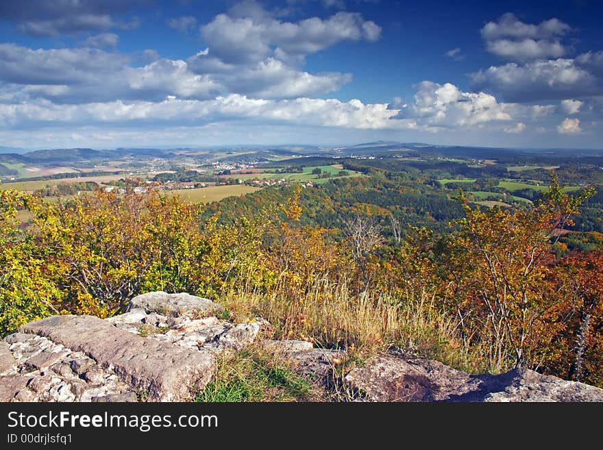 Autumn landscape with blue sky and clouds