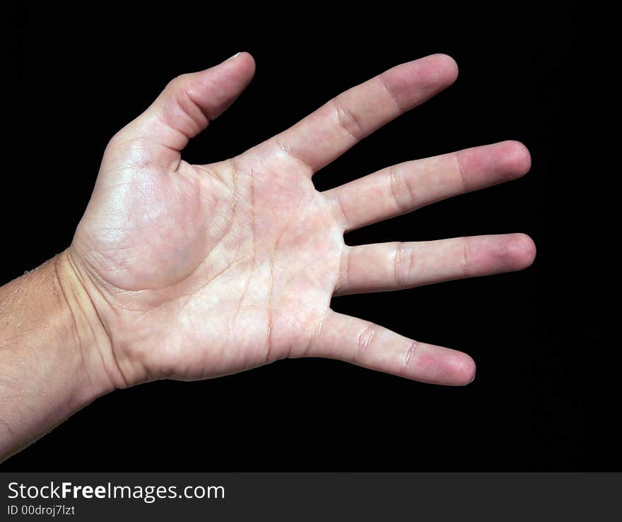 Open Palm Of A Hand On A Black Background