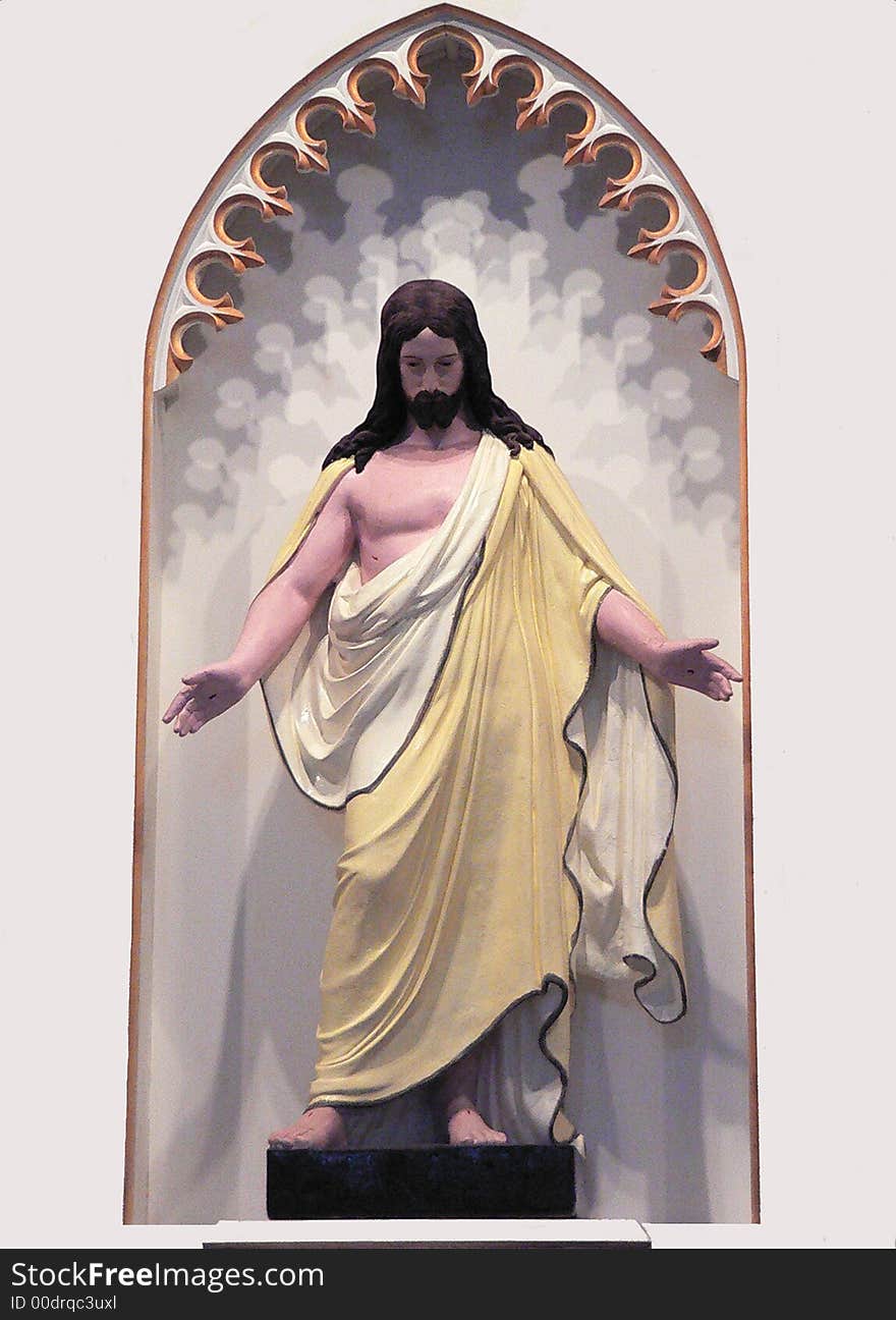 Statue of Jesus in a painted niche