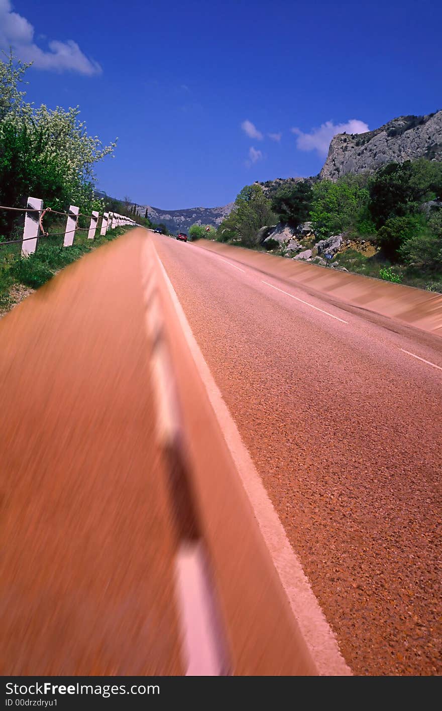 Highway in mountains, early spring