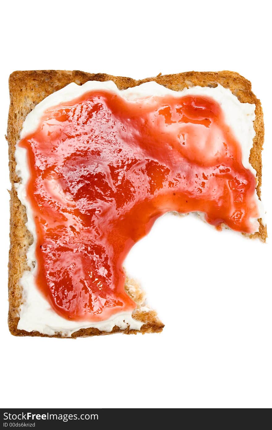 Eating a toast with raspberry jam. Isolated on a white background. Eating a toast with raspberry jam. Isolated on a white background.