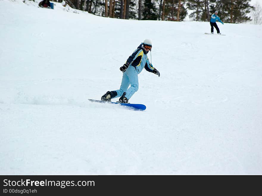 A girl on the snowboard