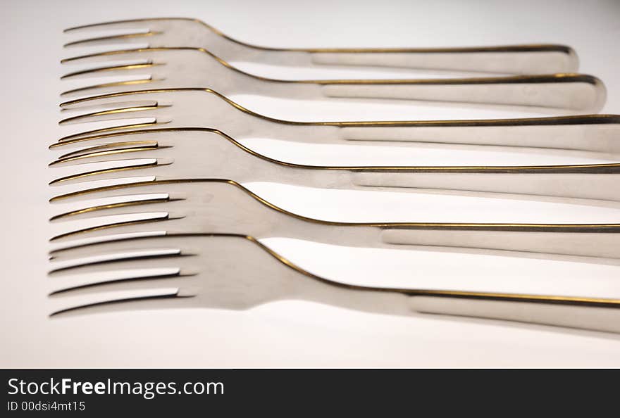 Forks set in a line