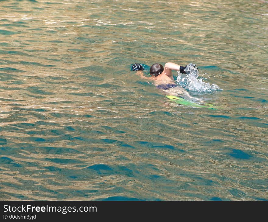 Boy swimming in the sea