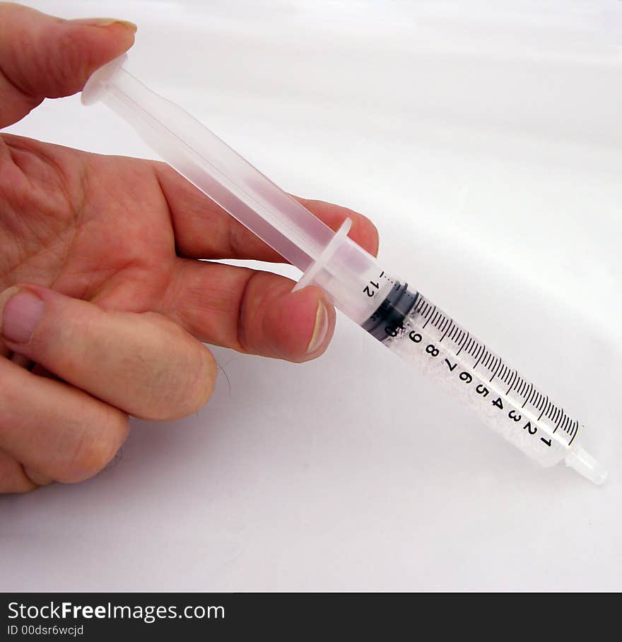 Syringe with 10cc of medicine for someone