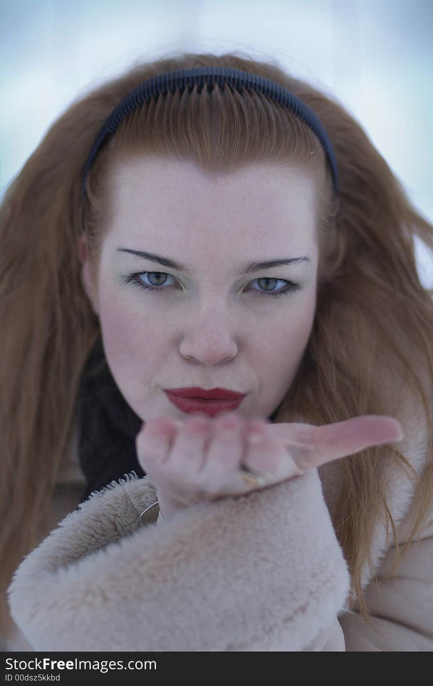 Girl blowing a kiss