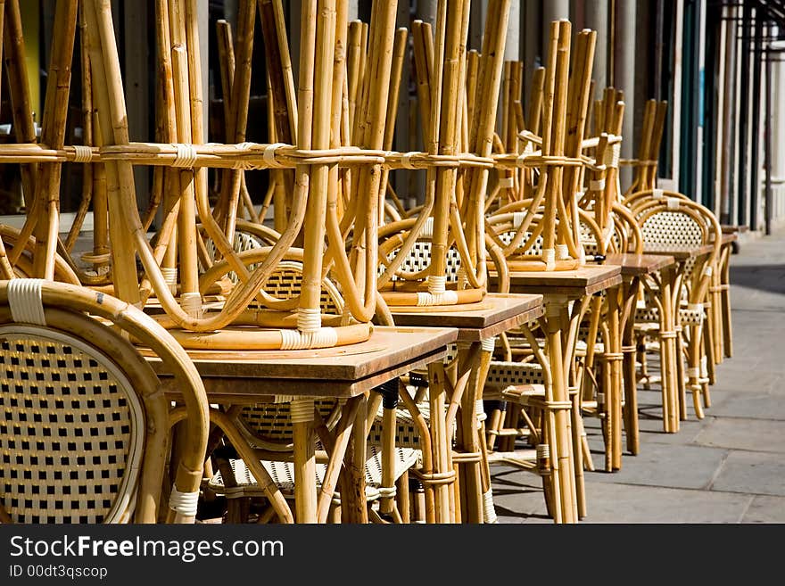 Rattan Chairs and Tables on a New York City Street