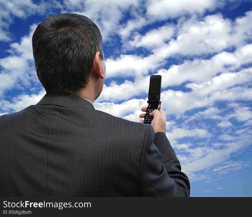 Salesman calling with his new cellphone