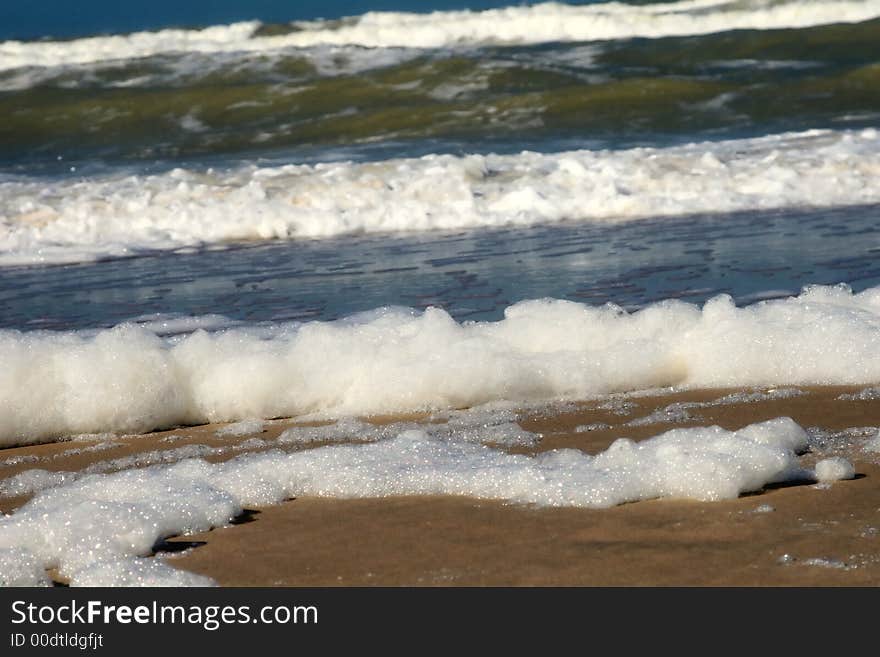 Sea and waves at a sunny day