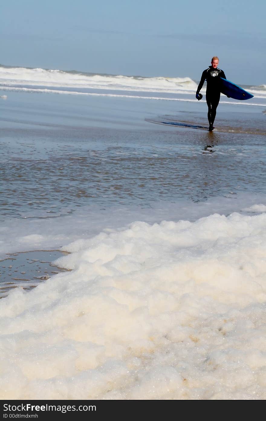 Young Man Going To Surf